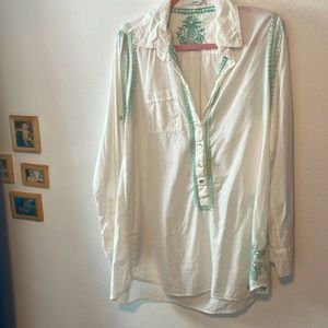 White button down blouse with teal embroidery,